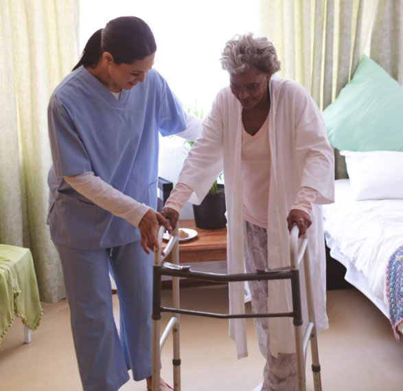 caregiver assisting her patient